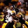 PITTSBURGH - JANUARY 18:  Derrick Mason #85 of the Baltimore Ravens can't make a catch as he is hit by Ryan Clark #25 of the Pittsburgh Steelers during the AFC Championship game on January 18, 2009 at Heinz Field in Pittsburgh, Pennsylvania.  (Photo by St