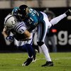 JACKSONVILLE, FL - DECEMBER 18:  Anthony Gonzalez #11 of the Indianapolis Colts is tackled by Drayton Florence #21 of the Jacksonville Jaguars during the game at Jacksonville Municipal Stadium on December 18, 2008 in Jacksonville, Florida.  (Photo by Sam 