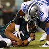 PHILADELPHIA - DECEMBER 28:  Bradie James #56 of the Dallas Cowboys sacks Donovan McNabb #5 of the Philadelphia Eagles on December 28, 2008 at Lincoln Financial Field in Philadelphia, Pennsylvania.  (Photo by Jim McIsaac/Getty Images)