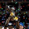 TAMPA, FL - FEBRUARY 01:  Super Bowl MVP Santonio Holmes #10 (L) and Quarterback Ben Roethlisberger #7  of the Pittsburgh Steelers celebrate with the Vince Lombardi trophy after they defeated the Arizona Cardinals 27-23 during Super Bowl XLIII on February