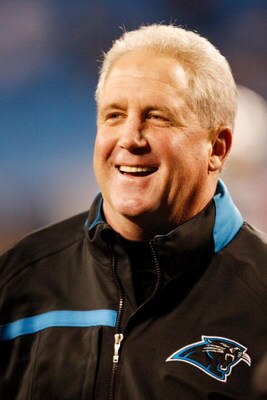 CHARLOTTE, NC - JANUARY 10:  John Fox Head Coach of the Carolina Panthers smiles during warm-ups before the game against the Arizona Cardinals during the NFC Divisional Playoff Game on January 10, 2009 at Bank of America Stadium in Charlotte, North Caroli