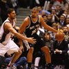 EAST RUTHERFORD, NJ - FEBRUARY 10:  Tim Duncan #21 of the San Antonio Spurs dribbles against Brook Lopez #11 of The New Jersey Nets during their game on February 10, 2009 at The Izod Center in East Rutherford, New Jersey.  NOTE TO USER: User expressly ack