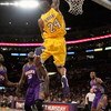 LOS ANGELES, CA - FEBRUARY 26:  Kobe Bryant #24 of the Los Angeles Lakers dunks as Shaquille O'Neal #32 of the Phoenix Suns looks on during the NBA game at Staples Center on February 26, 2009 in Los Angeles, California.  NOTE TO USER: User expressly ackno