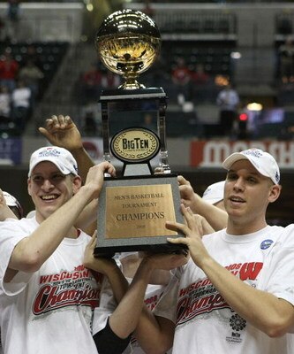 INDIANAPOLIS - MARCH 16:  (L-R) Brian Butch #32 and Greg Stiemsma #34 of the Wisconsin Badgers celebrate with the tournament championship trophy after their 61-48 win against the Illinois Fighting Illini during the Championship game of the Big Ten Men's B