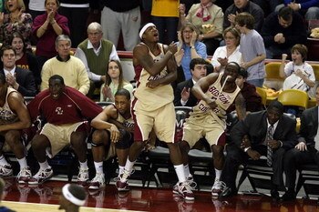 CHESTNUT HILL, MA - FEBRUARY 15:  Cory Raji #11 and Biko Paris #5 of the Boston College Eagles celebrate from the bench after the Eagles defeated the Duke Blue Devils on February 15, 2009 at Conte Forum in Chestnut Hill, Massachusetts. Boston College defe