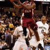 WINSTON-SALEM, NC - FEBRUARY 14:  Toney Douglas #23 of the Florida State Seminoles goes to the basket as Jeff Teague #0 of the Wake Forest Demon Deacons watches on during their game at Lawrence Joel Coliseum on February 14, 2009 in Winston-Salem, North Ca