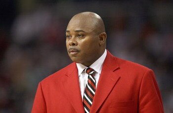 TAMPA, FL - MARCH 11: Head coach Sidney Lowe of the North Carolina State Wolfpack encourages his team against the North Carolina Tar Heels in the ACC Men's Basketball Tournament Championship on March 11, 2007 at the St. Pete Times Forum in Tampa, Florida.