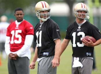 SANTA CLARA, CA - MAY 01:  Michael Crabtree #15 of the San Francisco 49ers looks on during practice as quaterback Alex Smith #11 and Shaun Hill #13 practice during the 49ers Minicamp at their training facilities on May 1, 2009 in Santa Clara, California. 