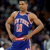 DENVER - 1989:  Rod Strickland #11 of the New York Knicks rests during an NBA game against the Denver Nuggets at McNichols Sports Arena in Denver, Colorado in 1989.  (Photo by: Tim Defrisco/Getty Images)