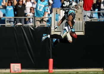 CHARLOTTE, NC - OCTOBER 26:  Steve Smith #89 of the Carolina Panthers jumps into the endzone for a touchdown against the Arizona Cardinals during their game  on October 26, 2008 at Bank of America Stadium in Charlotte, North Carolina.  (Photo by Streeter 