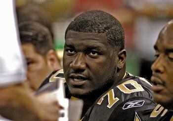 New Orleans Saints rookie tackle Jamal Brown checks play  during  a pre-season game against the Baltimore Ravens  August 26, 2005 in New Orleans.  (Photo by Al Messerschmidt/Getty Images)