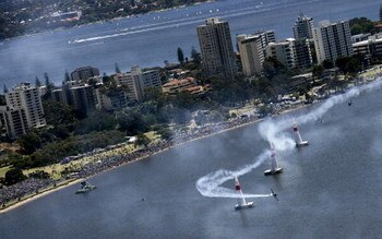 PERTH, AUSTRALIA - NOVEMBER 04: US Pilot Mike Mangold competes during the Red Bull Air Race held on the Swan River November 4, 2007 in Perth, Australia.  (Photo by Handout/Getty Images)
