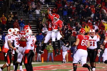 PISCATAWAY, NJ - DECEMBER 04:  Tiquan Underwood #7 of the Rutgers Scarlet Knights celebrates his touchdown in the first quarter with teammate Kenny Britt #88 against the Louisville Cardinals at Rutgers Stadium on December 4, 2008 in Piscataway, New Jersey