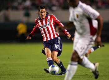 CARSON, CA - NOVEMBER 08:  Sacha Kljestan #16 of CD Chivas USA passes the ball on the attack in the first half during the second leg of their MLS playoff match against Real Salt Lake at The Home Depot Center on November 8, 2008 in Carson, California. Real