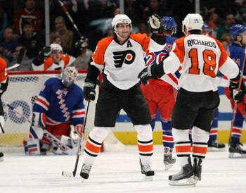 NEW YORK - MARCH 15: Simon Ggane #12 of the Philadelphia Flyers celebrates his power play goal at 4:32 of the second period against the New York Rangers on March 15, 2009 at Madison Square Garden in New York City. (Photo by Bruce Bennett/Getty Images)