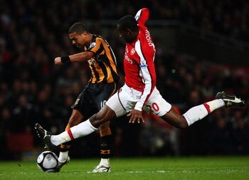 LONDON - MARCH 17: Johan Djourou of Arsenal challenges Geovanni of Hull City during the the FA Cup Sponsored by E.on sixth round match between Arsenal and Hull City at Emirates Stadium on March 17, 2009 in London, England.  (Photo by Ryan Pierse/Getty Ima