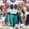 GLENDALE, AZ - SEPTEMBER 14:  Matt Roth #98 of the Miami Dolphins reacts during the first half against the Arizona Cardinals at University of Phoenix Stadium on September 14, 2008 in Glendale, Arizona.  (Photo by Lisa Blumenfeld/Getty Images)