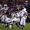 MINNEAPOLIS - SEPTEMBER 14:  Wide receiver Anthony Gonzalez (R) #11 of the Indianapolis Colts is tackled by Tyrell Johnson #25 of the Minnesota Vikings in the fourth quarter at the Metrodome on September 14, 2008 in Minneapolis, Minnesota. The Colts defea