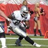 TAMPA, FL - DECEMBER 28: Running back Michael Bush #29 of the Oakland Raiders rushes upfield against the Tampa Bay Buccaneers at Raymond James Stadium on December 28, 2008 in Tampa, Florida.  (Photo by Al Messerschmidt/Getty Images)