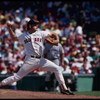 24 Dec 1996: Pitcher Roger Clemens of the Boston Red Sox winds up to throw a fast ball at Fenway Park in Boston, Massachusetts.
