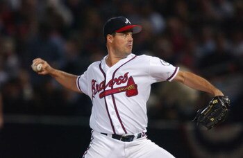 ATLANTA - OCTOBER 20:  Pitcher Greg Maddux #31 of the Atlanta Braves throws a pitch against the Arizona Diamondbacks on October 20, 2002 in the first inning of game four of the National League Championship Series at Turner Field in Atlanta, Georgia.  The 