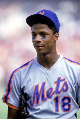 1990: Darryl Strawberry of the New York Mets looks on during a game in the 1990 season. (Photo by: Stephen Dunn/Getty Images