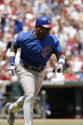 ST. LOUIS - JULY 10:  Sammy Sosa #21 of the Chicago Cubs runs during the game against the St. Louis Cardinals on July 10, 2004 at Busch Stadium in St. Louis, Missouri.  The Cardinals won 5-2.  (Photo by Elsa/Getty Images) 