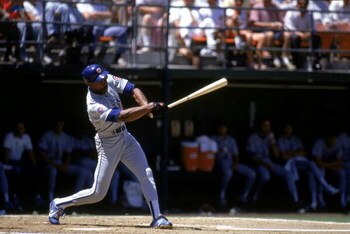 SAN DIEGO - 1990:  Andre Dawson #8 of the Chicago Cubs swings the bat during a game with the San Diego Padres in 1990 at Jack Murphy Stadium in San Diego, California.  (Photo by Stephen Dunn/Getty Images)     