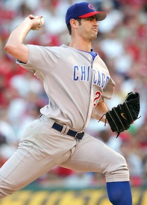 ST. LOUIS - JULY 24:  Mark Prior #22 of the Chicago Cubs delivers a pitch in the first inning against the St. Louis Cardinals on July 24, 2005 at Busch Stadium in St. Louis, Missouri.  (Photo by Elsa/Getty Images)