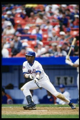 13 Apr 1997: Lance Johnson of the New York Mets bunts the ball during the Mets 5-1 loss to the San Francisco Giants at Shea Stadium in Flushing, New York.