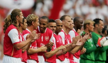 LONDON - JULY 22:  Thierry Henry (C) of Arsenal enjoys a joke  during the Dennis Bergkamp testimonial match between Arsenal and Ajax at the Emirates Stadium on July 22, 2006 in London, England.  (Photo by Jamie McDonald/Getty Images)