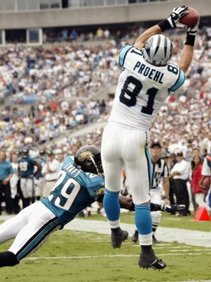 CHARLOTTE, NC - SEPTEMBER 7:  Jason Craft #29 of the Jacksonville Jaguars can't stop the winning touchdown catch by Ricky Proehl #81 of the Carolina Panthers on September 7, 2003 at Ericsson Stadium in Charlotte, North Carolina. The Panthers defeated the 