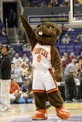 LOS ANGELES - MARCH 13:  The Oregon State Beaver mascot cheers on the court during the Pac 10 tournament against California on March 13, 2003 at the Staples Center in Los Angeles, California. California won 69-46.  (Photo by Stephen Dunn/Getty Images)