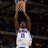 24 Mar 2002: Aaron Miles #11 of Kansas shoots for two against Oregon during the NCAA Men's Basketball Tournament at the Kohl Center in Madison, Wisconsin. The Kansas Jayhawks beat the Oregon Ducks 104-86 to advance to the Final Four in Atlanta, Georgia. D