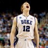 GREENSBORO, NC - MARCH 21:  Kyle Singler #12 of the Duke Blue Devils yells before facing the Texas Longhorns during the second round of the NCAA Division I Men's Basketball Tournament at the Greensboro Coliseum on March 21, 2009 in Greensboro, North Carol