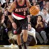 SEATTLE - NOVEMBER 7:  Damon Stoudamire #3 of the Portland Trail Blazers pushes the ball up court during the game against the Seattle Sonics in Key Arena on November 7, 2003 in Seattle, Washington.  The Sonics won 100-82.  NOTE TO USER: User expressly ack