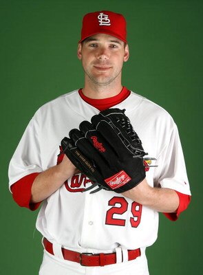 JUPITER, FL - FEBRUARY 20:  Pitcher Chris Carpenter #29 of the St. Louis Cardinals poses during photo day at Roger Dean Stadium on February 20, 2009 in Jupiter, Florida.  (Photo by Doug Benc/Getty Images)