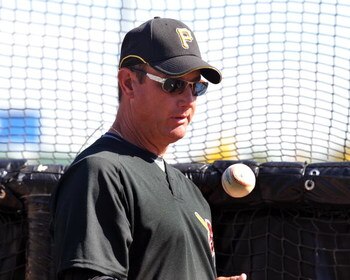 BRADENTON, FL - MARCH 8:  Manager John Russell #7 of the Pittsburgh Pirates tosses a ball before play against the Houston Astros March 8, 2009 at McKechnie Field in Bradenton, Florida.  (Photo by Al Messerschmidt/Getty Images)