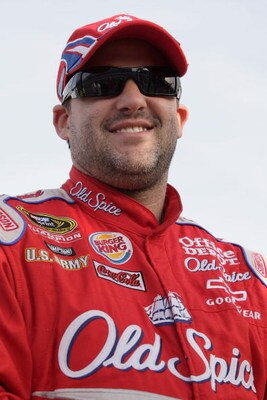 LAS VEGAS - FEBRUARY 27:  Tony Stewart driver of the #14 Old Spice Chevrolet stands on pit road during qualifying for the NASCAR Sprint Cup Series Shelby 427 at the Las Vegas Motor Speedway on February 27, 2009 in Las Vegas, Nevada.  (Photo by John Harrel
