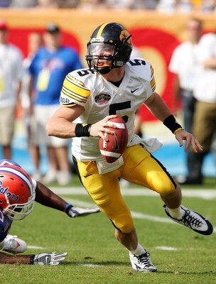 TAMPA, FL - JANUARY 2:  Drew Tate #5 of the Iowa Hawkeyes looks upfield to pass against the Florida Gators during the Outback Bowl on January 2, 2006 at Raymond James Stadium in Tampa, Florida.  (Photo by Scott Halleran/Getty Images)