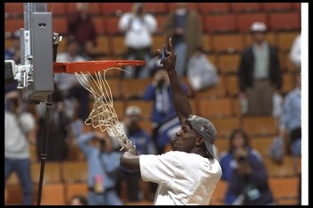 1 Apr 1996:  Guard and Most Outstanding Player Tony Delk of the Kentucky Wildcats cuts down the net in victory over the Syracuse Orangemen during the Final Four competition held at the Meadowlands Arena in East Rutherford, New Jersey.  Arizona won the gam