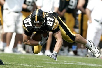 IOWA CITY, IA - SEPTEMBER 16: Tight end Scott Chandler #87 of the Iowa Hawkeyes dives for a first down against the Iowa State Cyclones at Kinnick Stadium on September 16, 2006 in Iowa City, Iowa. The Hawkeyes defeated Cyclones 27-17. (Photo by Scott Boehm