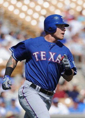 GLENDALE, AZ - MARCH 13:   Josh Hamilton #32 of the Texas Rangers runs the bases after hitting a homerun in the first inning during a Spring Training game against the Los Angeles Dodgers on March 13, 2009 at Camelback Ranch in Glendale, Arizona.  (Photo b