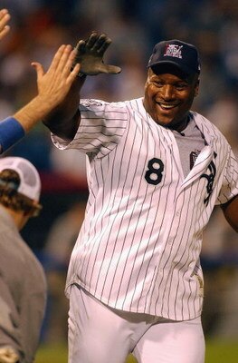 CHICAGO - JULY 13:  Former All-Star outfielder and NFL star Bo Jackson celebrates hitting a home run during the All Star Legends and Celebrity Softball Game on July 13, 2003 at U.S. Cellular Field in Chicago, Illinois. (Photo by Jonathan Daniel/Getty Imag