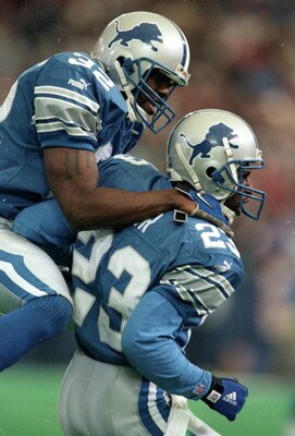 7 Nov 1999:  Bryant Westbrook #32 of the the Detriot Lions celebrates with Terry Fair #23 during the game against the St. Louis Rams at the Pontiac Silverdome in Pontiac, Michigan. The Lions defeated the Rams 31-27. Mandatory Credit: Tom Pidgeon/Allsport