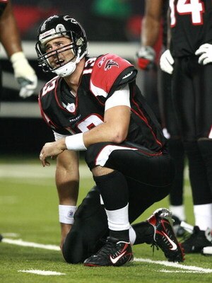 ATLANTA - OCTOBER 15:  Quarterback Joey Harrington #13 of the Atlanta Falcons grimaces after being injured on a sack by the New York Giants at Georgia Dome on October 15, 2007 in Atlanta, Georgia.  (Photo by Doug Benc/Getty Images)