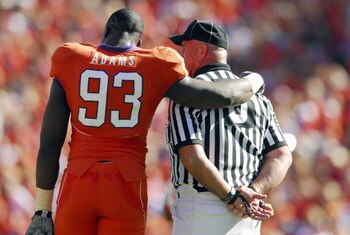 CLEMSON, SC - NOVEMBER 25:  Gaines Adams #93 of the Clemson Tigers talks with an official during the game against the South Carolina Gamecocks at Memorial Stadium on November 25, 2006 in Clemson, South Carolina. South Carolina won 31-28. (Photo by Grant H