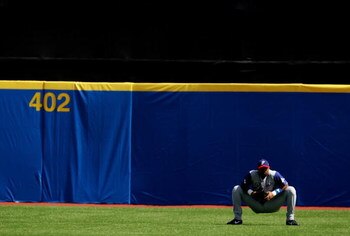 SAN JUAN, PR - MARCH 10:  Ruben Rivera #14 of Panama waits in the outfield during a pitching change against The Netherlands during their game at the World Baseball Classic at Hiram Bithorn Stadium on March 10, 2006 in San Juan, Puerto Rico.  (Photo by Al 