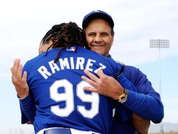 GLENDALE, AZ - MARCH 05:  Manny Ramirez #99 (L) of the Los Angeles Dodgers hugs manager Joe Torre #6 during a news conference on March 5, 2009, at Camelback Ranch in Glendale, Arizona, after he re-signed with the Dodgers.  (Photo by Kevork Djansezian/Gett