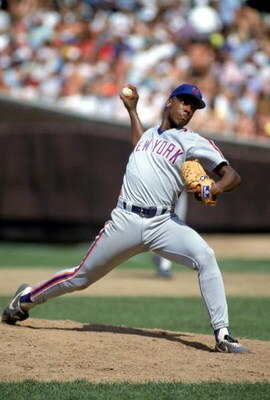 1990: Dwight Gooden of the New York Mets pitches during a game in the 1990 season. ( Photo by: Jonathan Daniel/Getty Images)